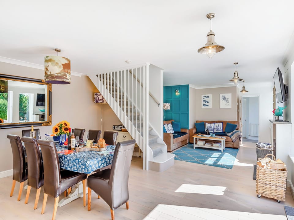 Enjoy family meals indoors or eat alfresco on the south facing rear deck with views | Tregarrek, Helston & The lizard