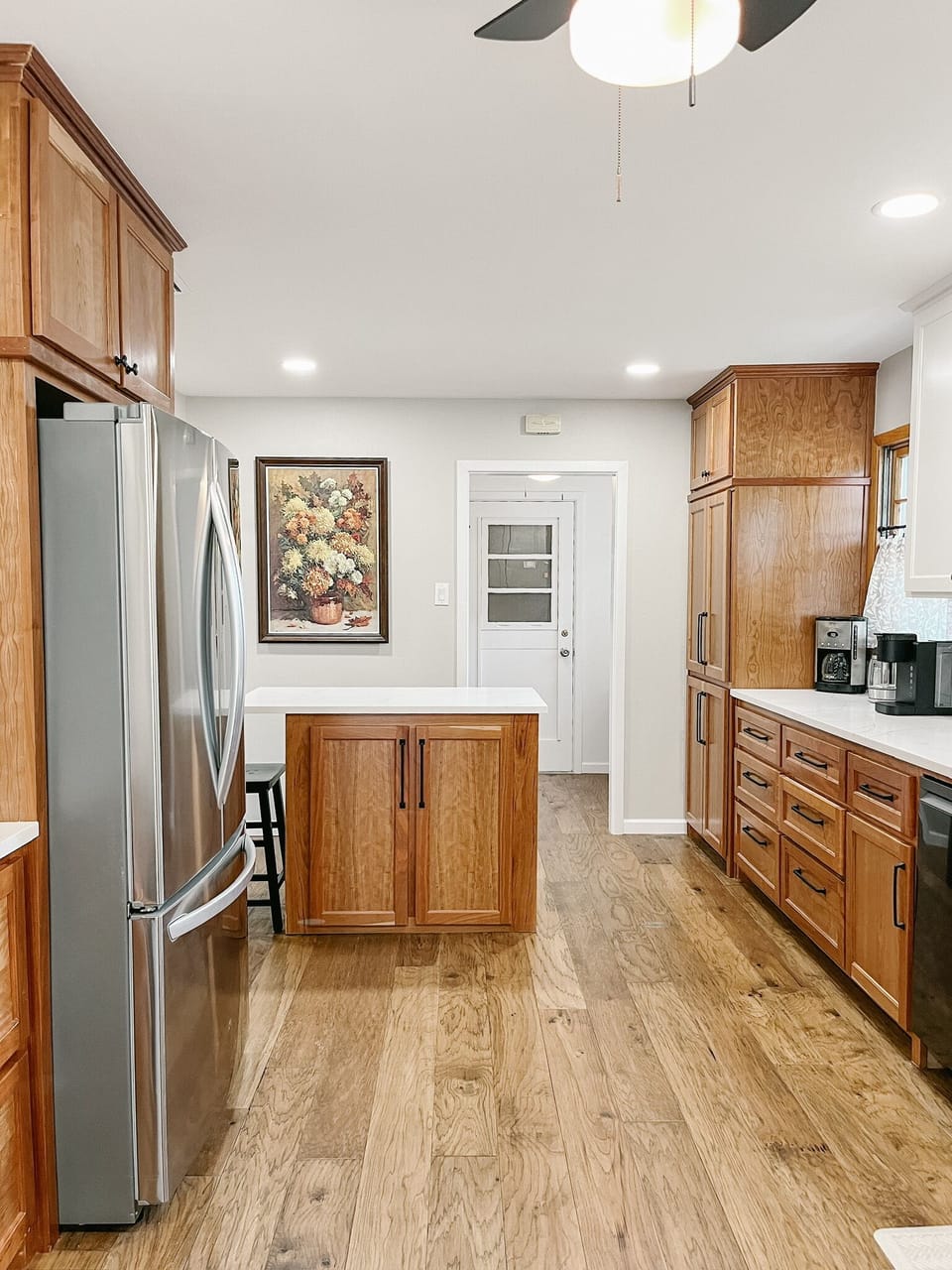 The large island provides bar stools for casual dining.