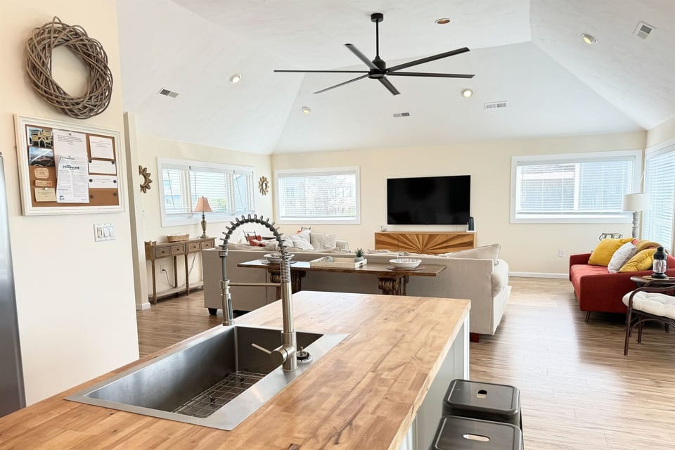 Enjoy the convenience of a kitchen that opens directly into the living room, making it easy to entertain and stay connected with family and friends.