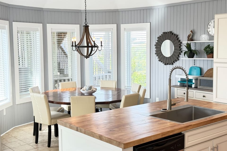 Gather around for memorable meals in this inviting dining area, comfortably seats 8 guests, perfect for family feasts and cozy dinners with friends.