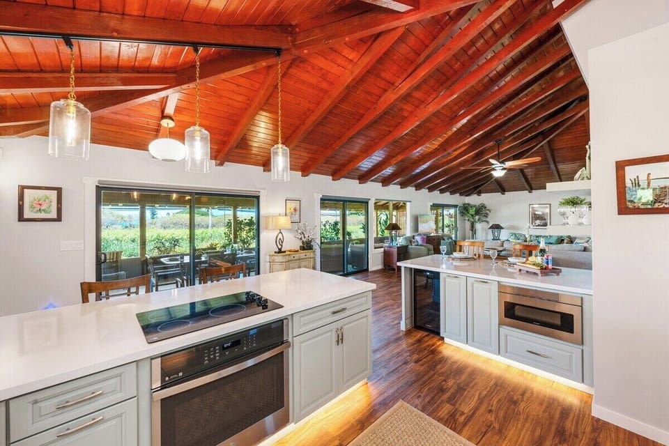 Cook and connect in this spacious kitchen with an island that keeps everyone together