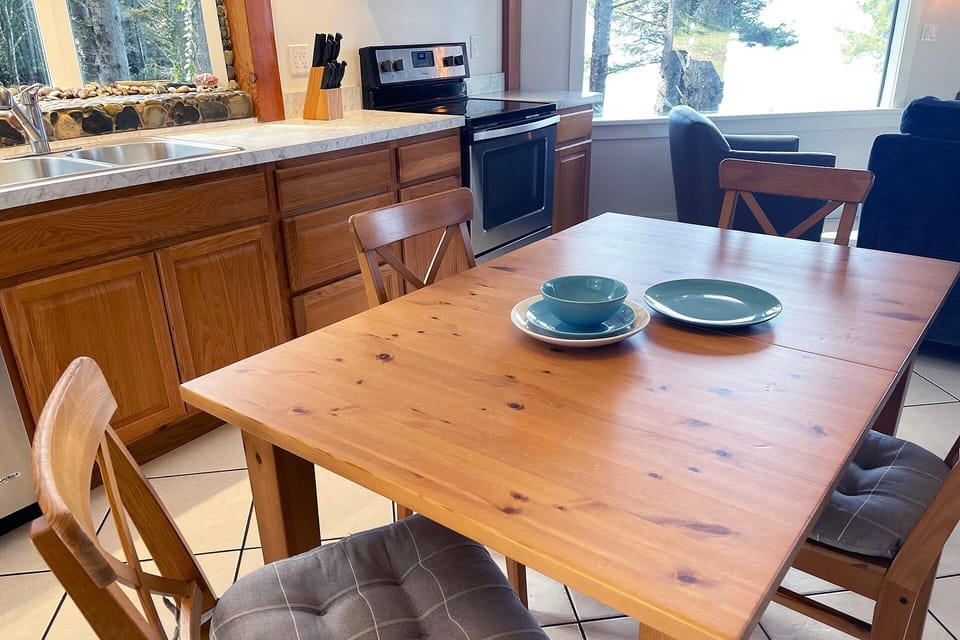 Eat and play board games at the dining room table.