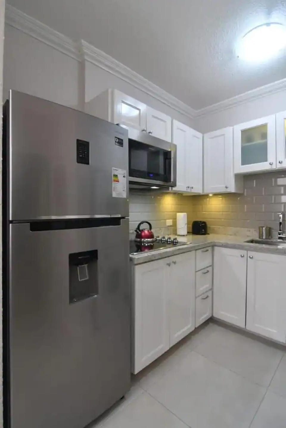 Apartment | Private kitchen | Fridge, microwave, oven, stovetop