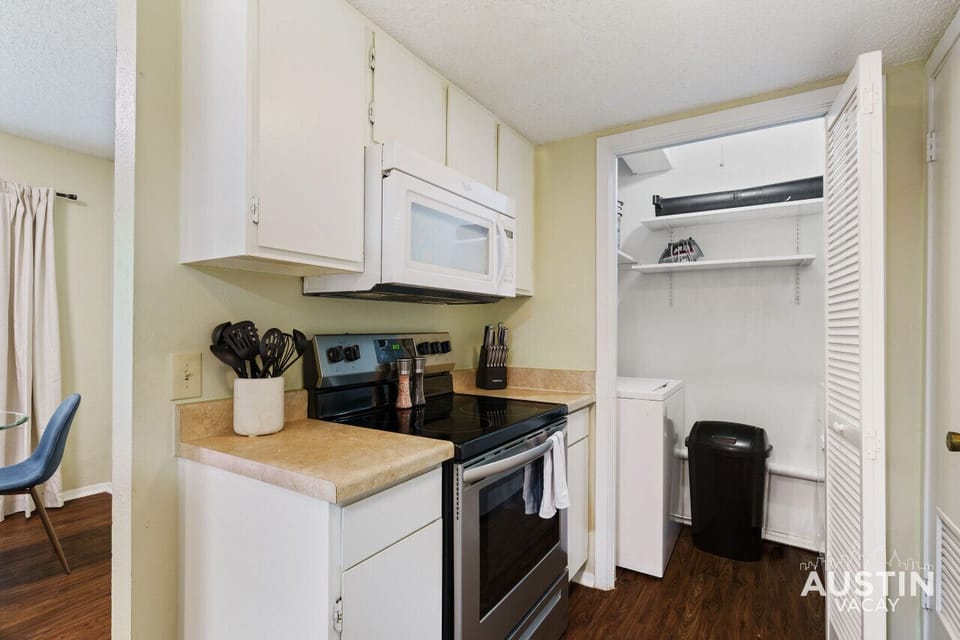 Full kitchen with all the essentials plus laundry and dishwasher