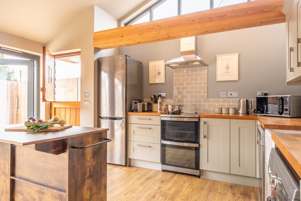 Ground floor: The kitchen is a mixture of fitted and free standing units