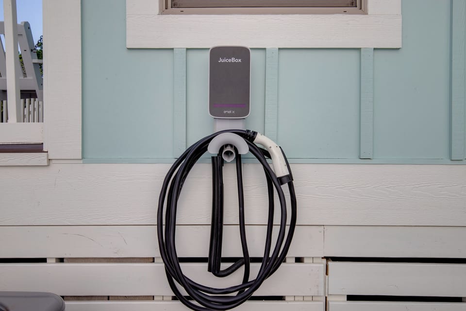 Modern electric vehicle charging station available for your eco-friendly travels, conveniently located on-site.