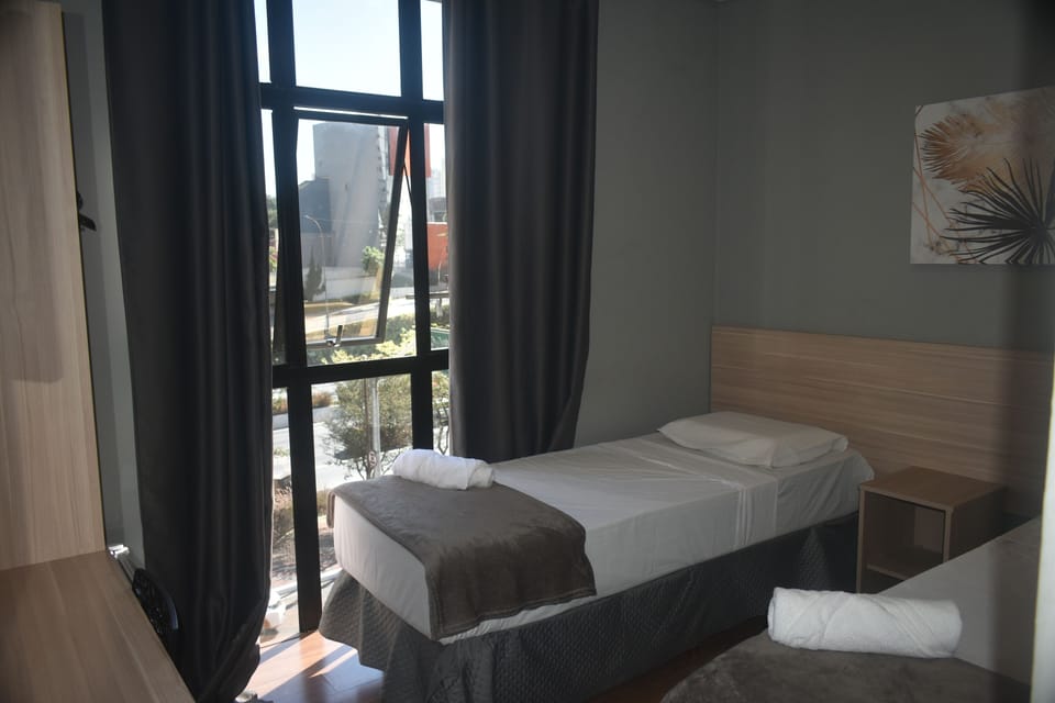 Standard Triple Room, City View | Laptop workspace, free WiFi