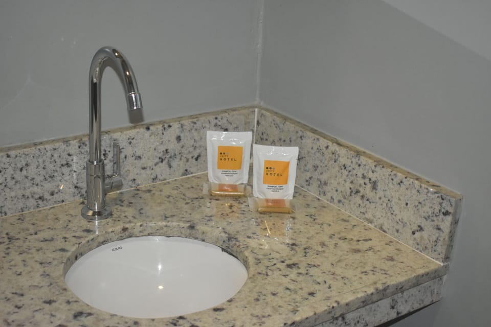 Standard Quadruple Room | Bathroom | Shower, free toiletries, towels, soap