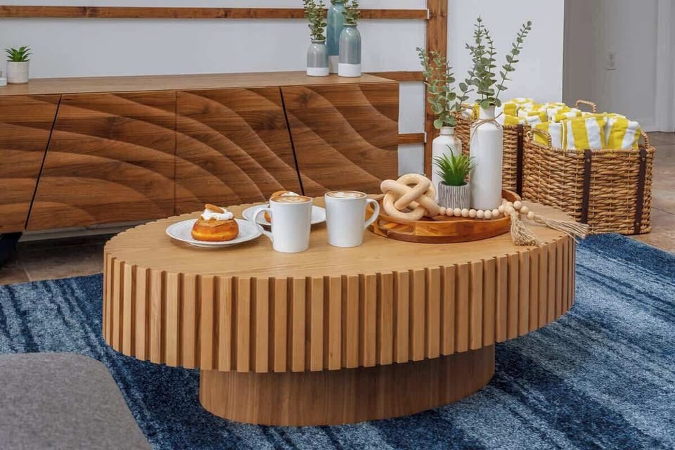 Start your day with a cozy coffee moment on this stylish wood table, surrounded by soothing decor and warm accents. Perfect for unwinding with a latte and treat before heading out for a day of adventure. ☕"