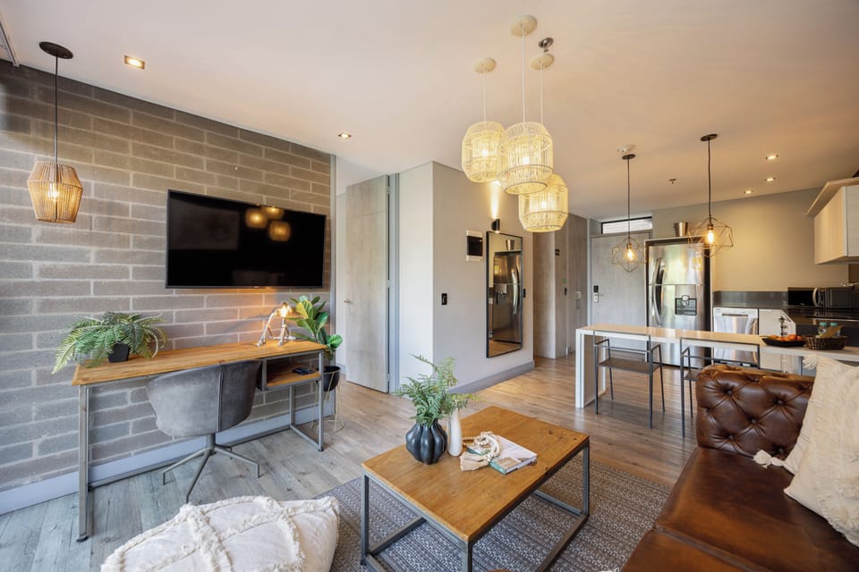 Apartment, 2 Bedrooms | Living area | 55-inch Smart TV with digital channels, toys