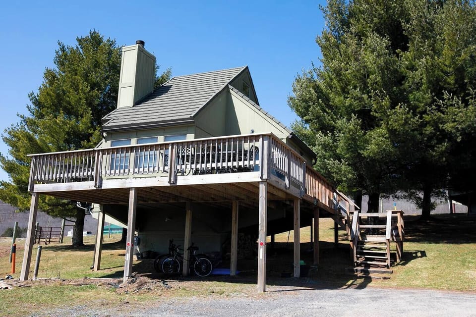 Extended deck with plenty of outdoor dining and seating. Gas grill. 