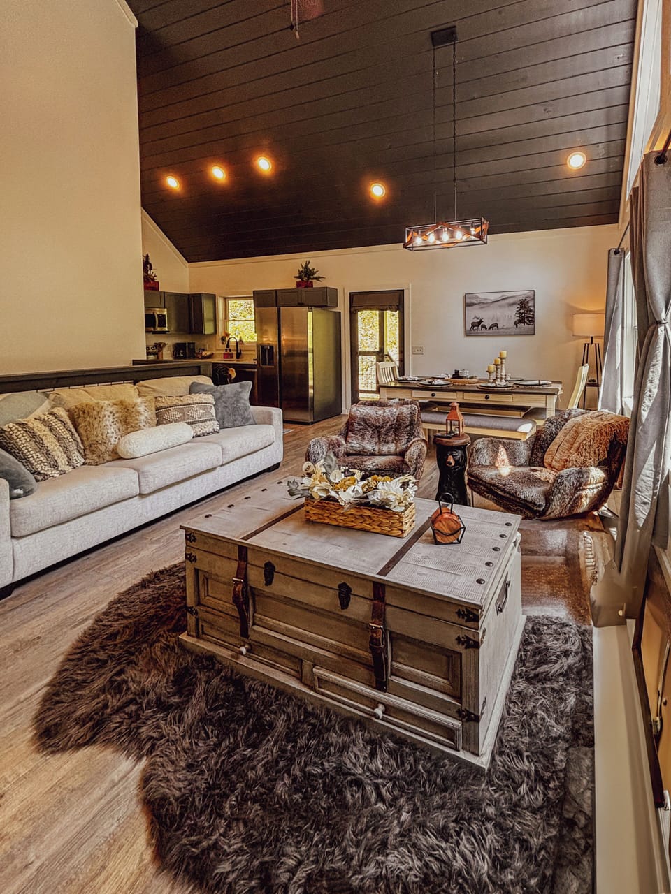 Open family/dining room with cathedral ceilings
