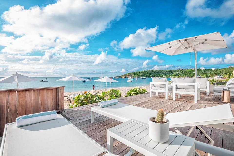 Relax on the two chaise lounge chairs provided on your private wood deck.