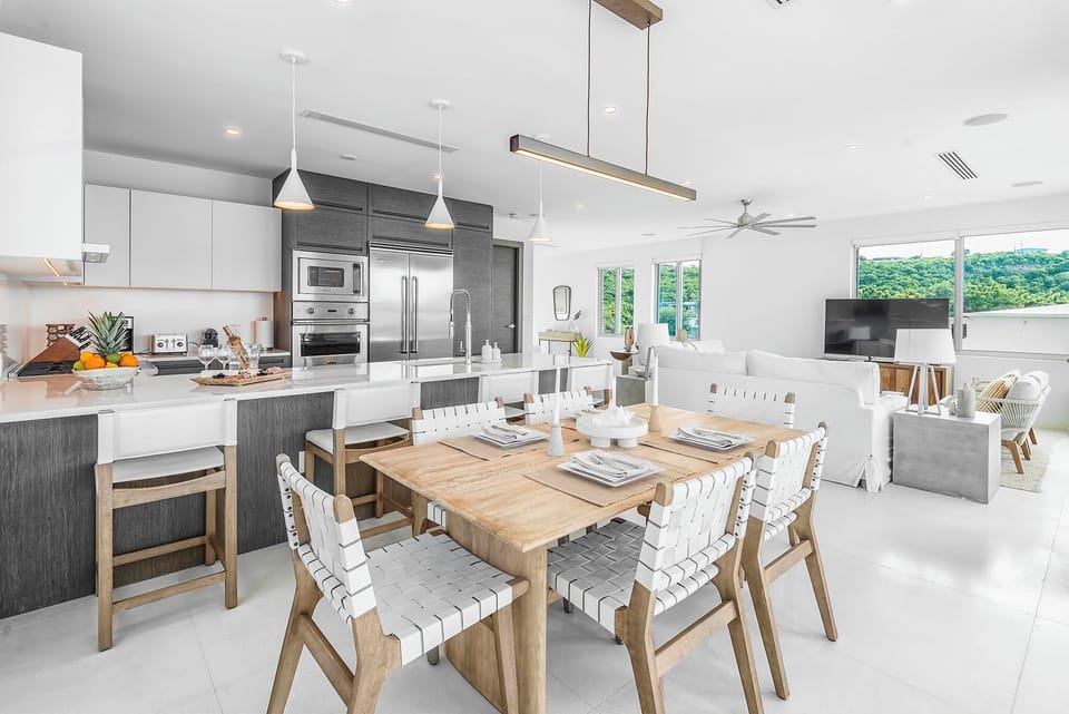 Dining room with seating for six off gourmet kitchen.