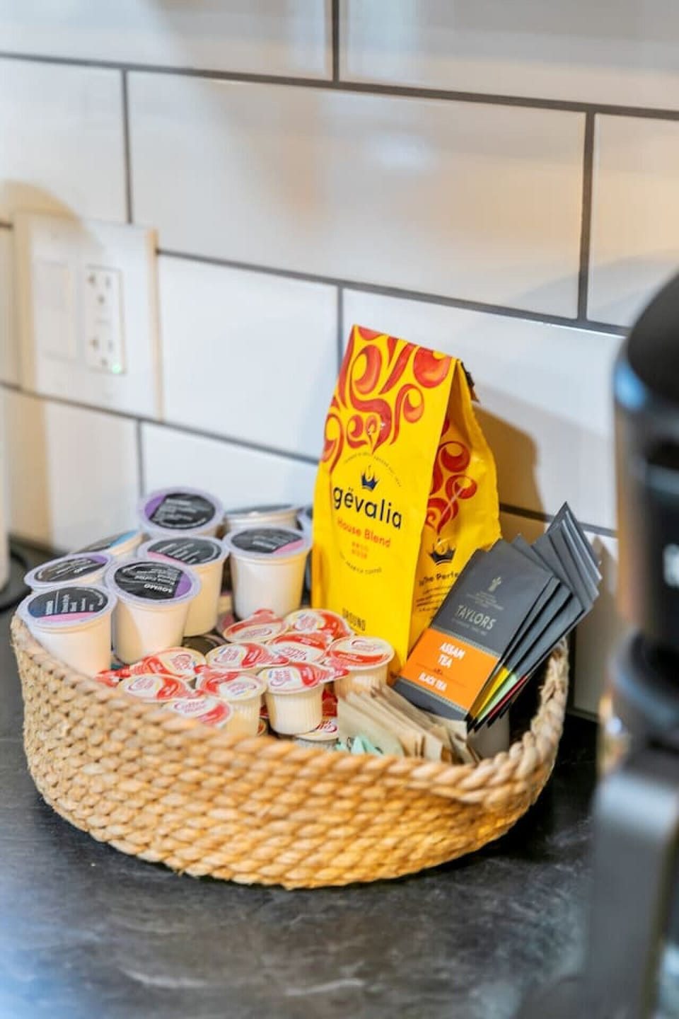 Coffee bar includes all the essentials for your morning brew including a 12 cup coffee maker, Keurig, and a starter pack of ground coffee, tea, k-cups, sweeteners, and creamer. Enjoy!