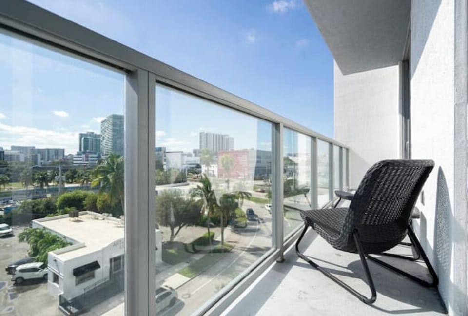Enjoy fresh air and city views from your private balcony.