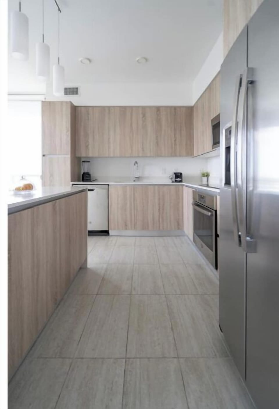 The sleek, fully equipped kitchen.