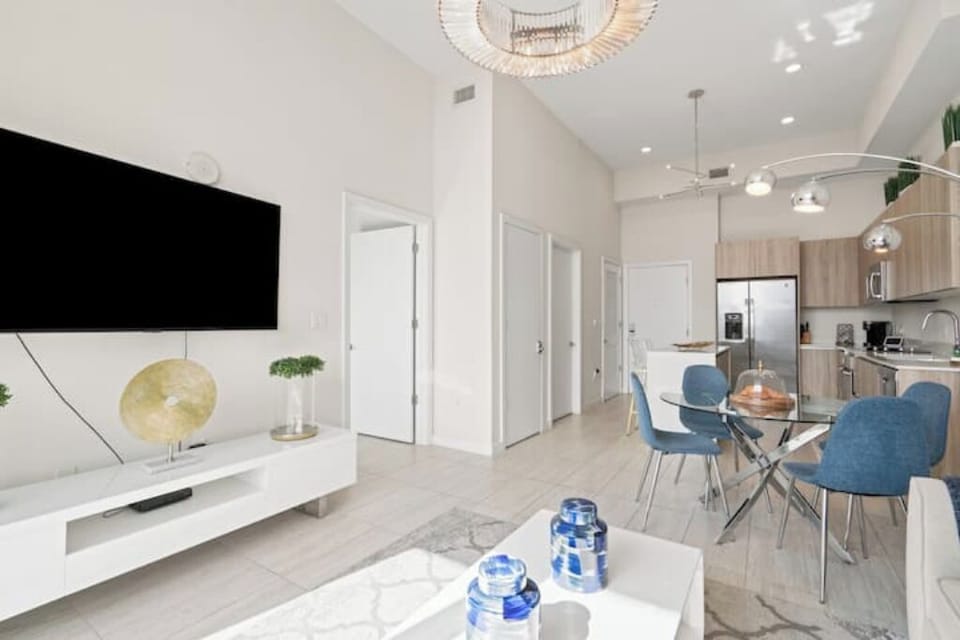 A wide view of the living room and dining space.