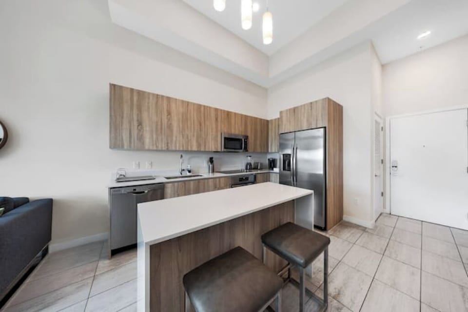 The kitchen island offers casual bar-style seating.