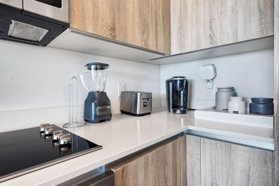 The kitchen is stocked with modern appliances.