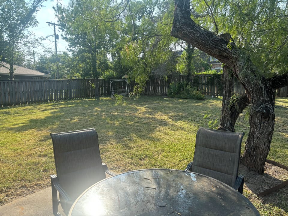 Enjoy some sunshine or cool Bryan breezes on the patio with our huge backyard. 