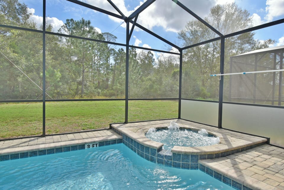 View of pool and spa