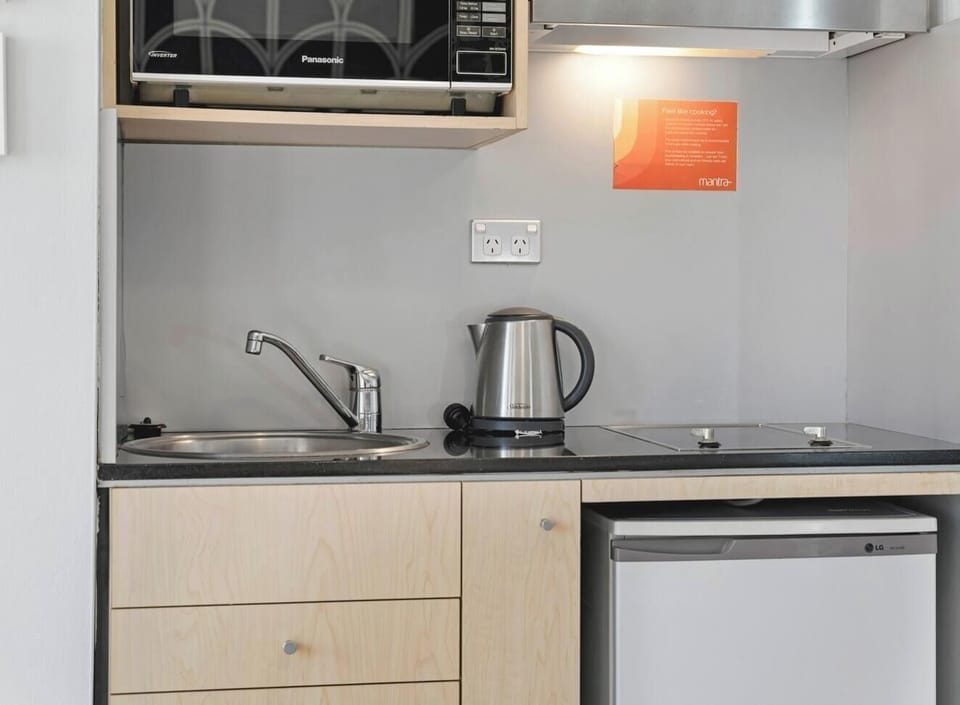 Simple kitchen area for drinks and light meals