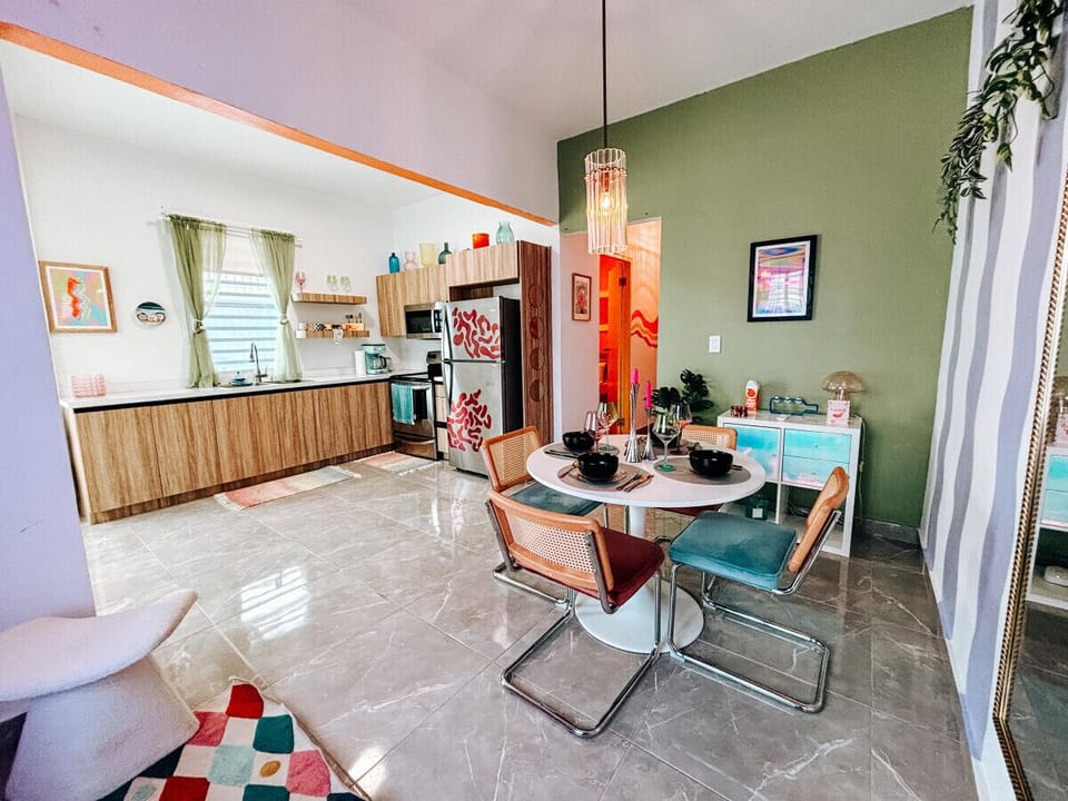 Gather around a vibrant dining table for meals and conversation.