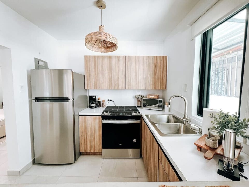 Fully equipped kitchen with modern appliances for all your cooking needs.