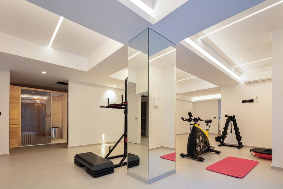 Stay fit on your holiday with our fully equipped fitness area—featuring free weights, XFit bike, yoga mats, and a Balance Trainer Ball.
