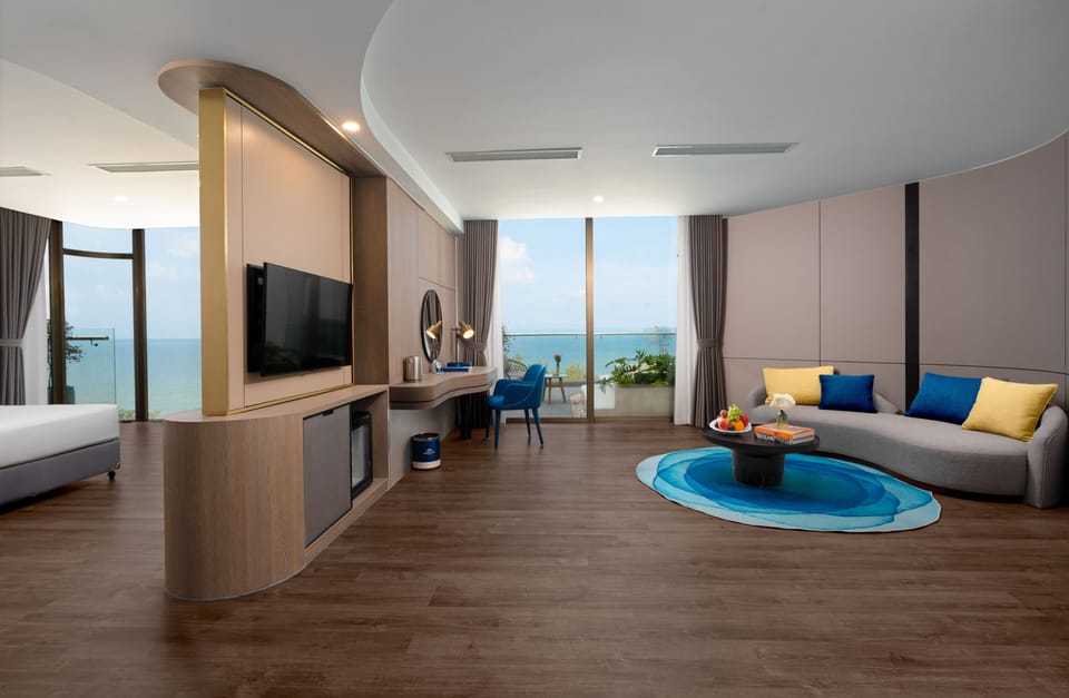 Executive Double Room, Ocean View | Living area | 45-inch TV with cable channels, printers