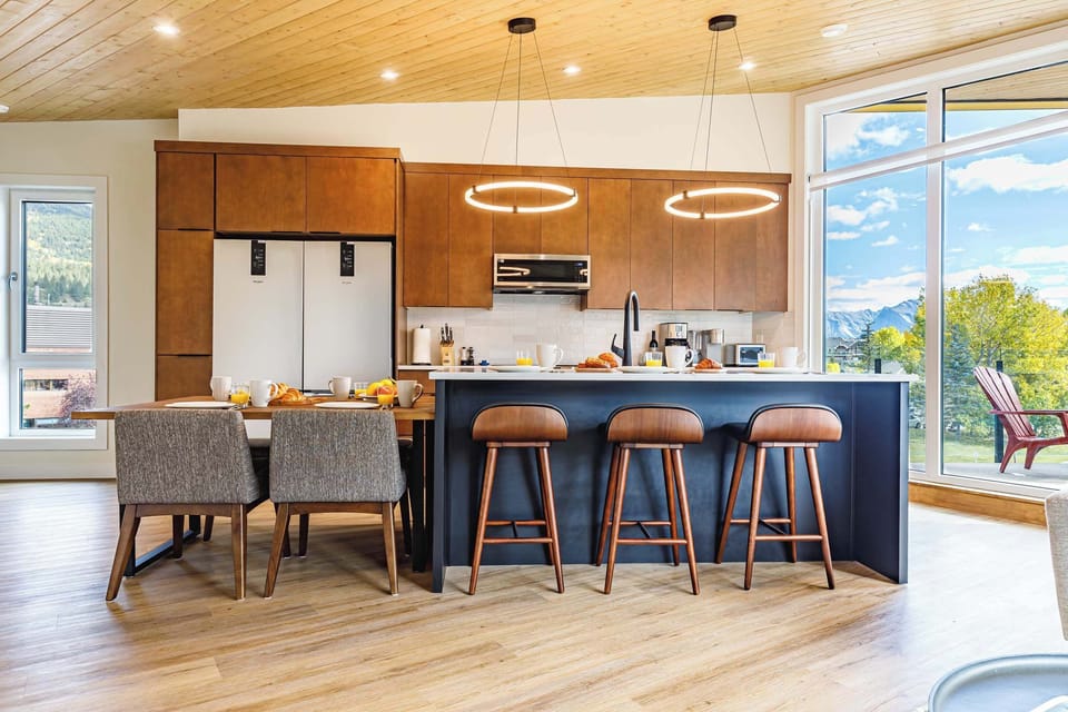 Full kitchen and dining space for easy meals at home with full-sized fridge to keep everything fresh during your stay.