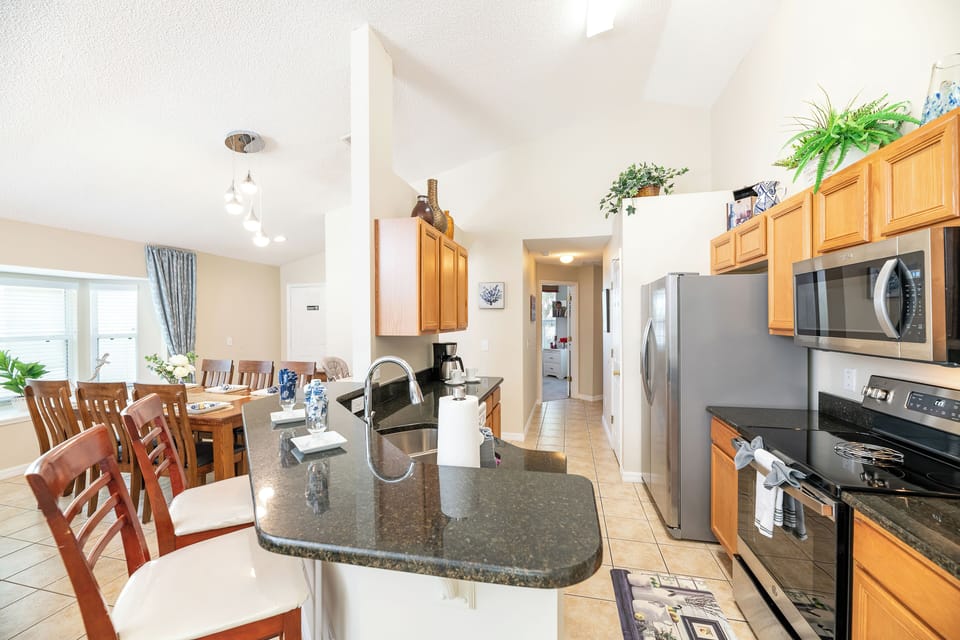 Breakfast bar overlooking kitchen area