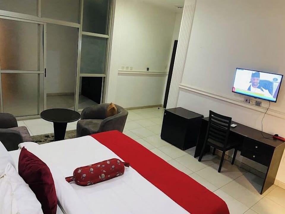 Deluxe Room, Balcony, City View | Desk, laptop workspace, free WiFi