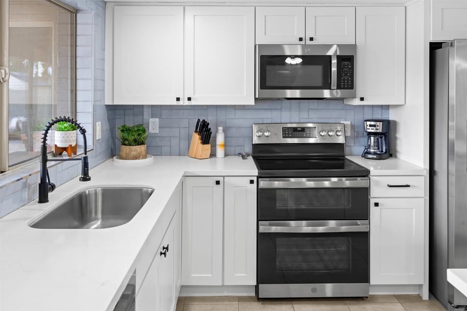 The kitchen is fully stocked with kitchen essentials
