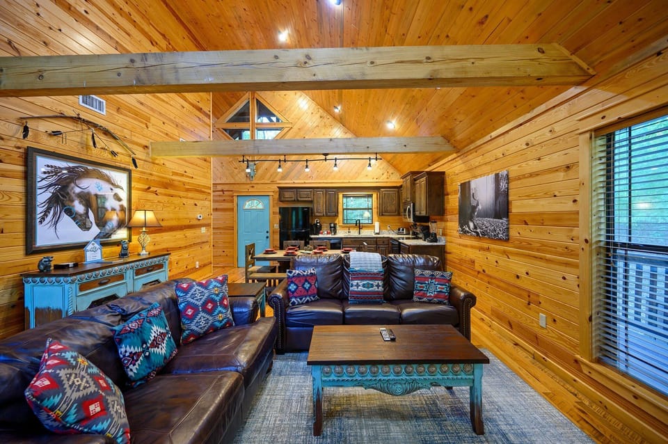 Tall ceilings make the room feel spacious while the beams enhance the authentic cabin design.