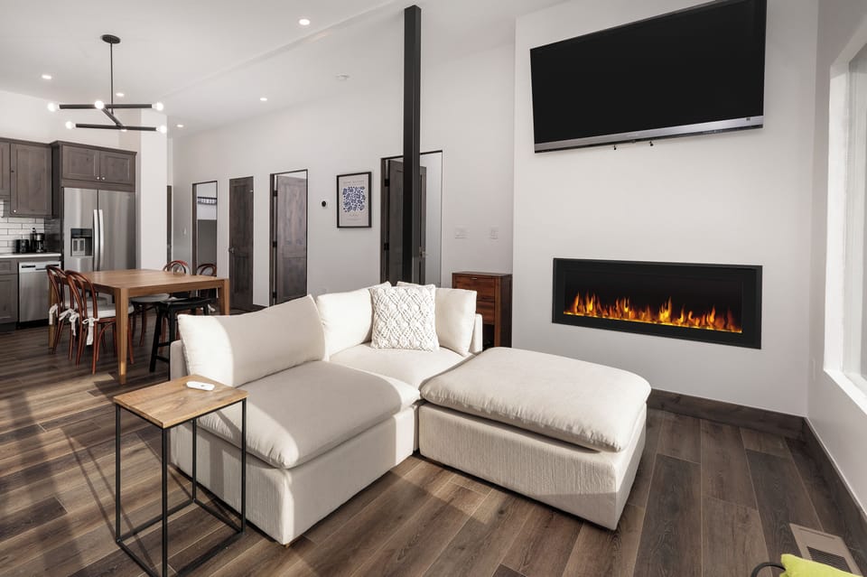 Wall mounted TV with a gas fireplace
