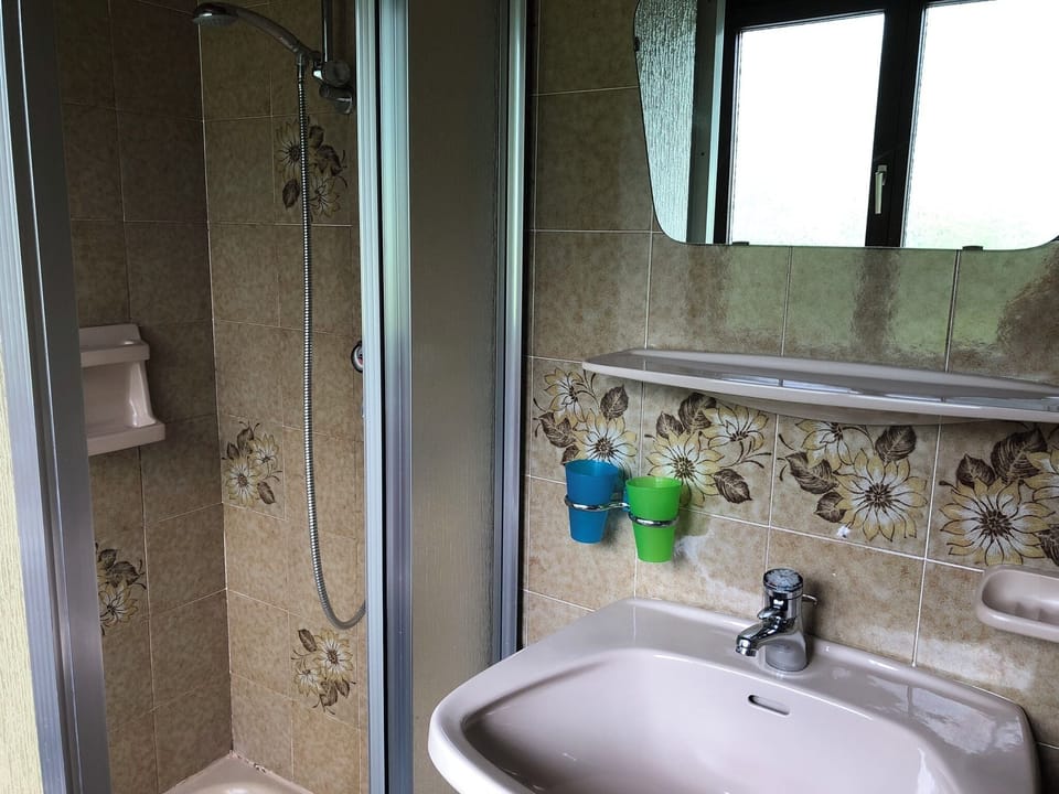 Shower, towels, soap, shampoo