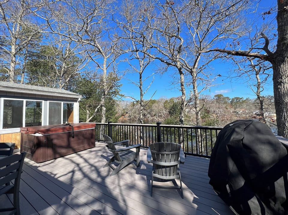 Deck with grill, hot tub and seating (Upper Level)