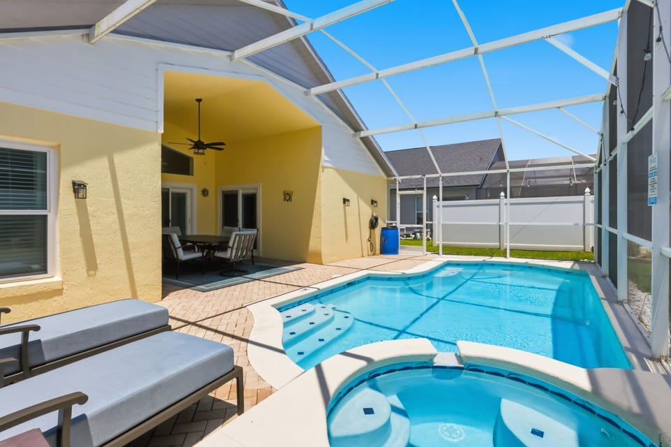 Enjoy your own screened-in private pool and spa with plenty of room to relax in the Florida sunshine.