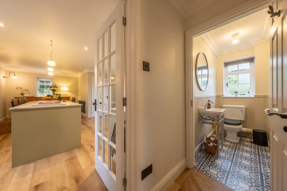 Ground floor: In to cloakroom and kitchen