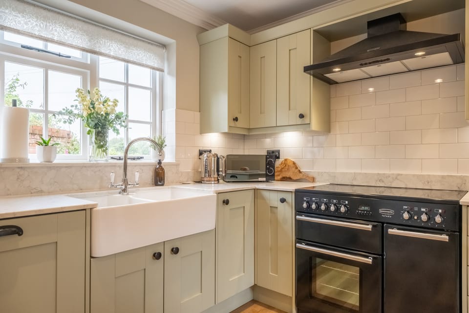 Ground floor: Kitchen with Butler's sink and Rangemaster cooker with electric hob
