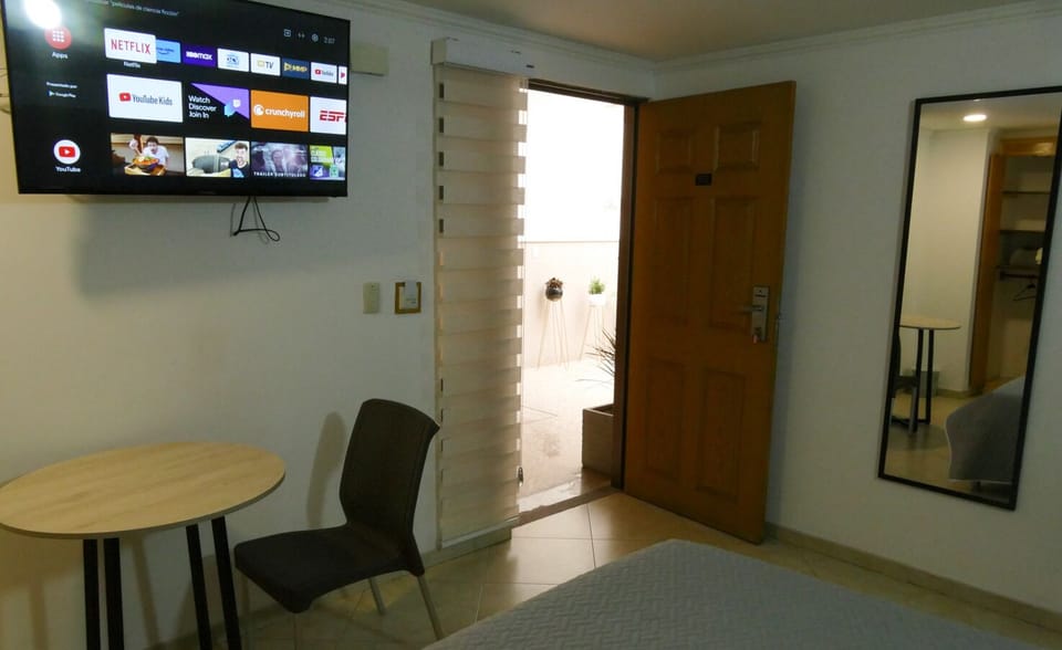 Double Room, City View | Desk, laptop workspace, iron/ironing board, free WiFi