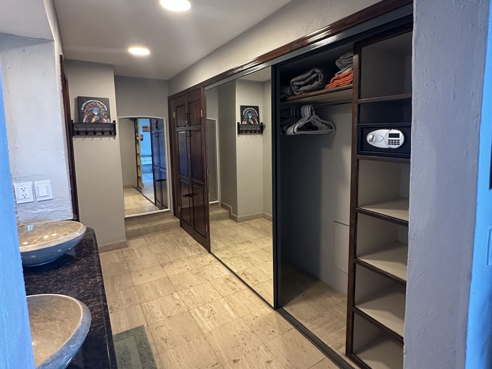 Closet with Safe in Owners Suite