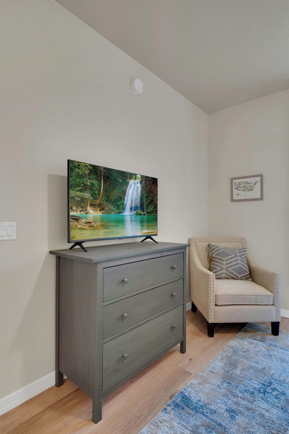 A private seating area and convenient storage in your bright and cozy bedroom.