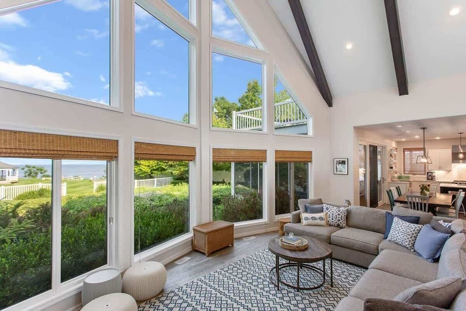 Large windows with light and airy space.  The expanse of Lake Michigan water views is seen from the main level and loft.  