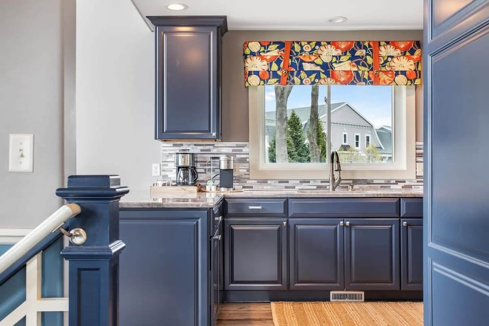 Large kitchen with a coastal-luxury theme