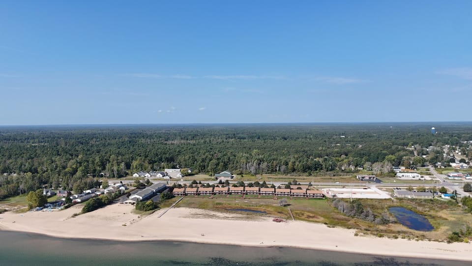OVERVIEW:  The gorgeous lakefront and private sandy beach for the condo development