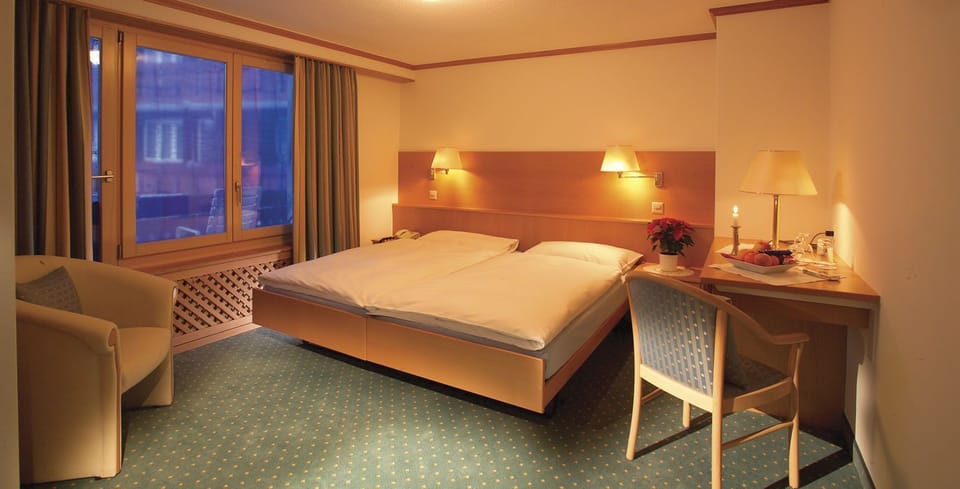 Standard Double Room | Minibar, in-room safe, desk, blackout drapes