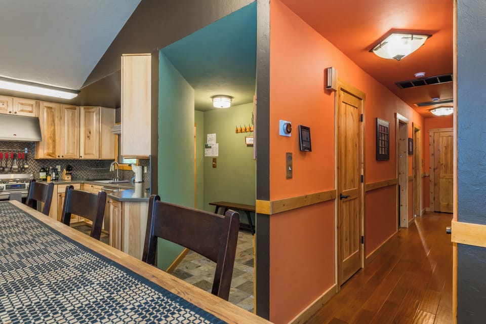 Front Door, Hallway to 3 Bedrooms, and Kitchen